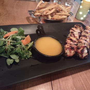 Stone Cut Bistro - Thai Chicken Kebabs, watercress salad, seasoned fries. - Mediterranean Near Me - Toledo, Ohio