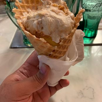 West Orange Creamery - Salted Bananas Foster in a warm waffle cone. - Desserts Near Me - Ocoee, Florida