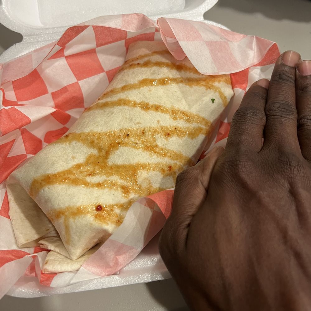 Smokin’ Gringo's - Grande Burrito size (my hand as a reference) - Tex-Mex Near Me - Summerville, South Carolina Smokin’ Gringo's - Grande Burrito size (my hand as a reference) - Tex-Mex Near Me - Summerville, South Carolina