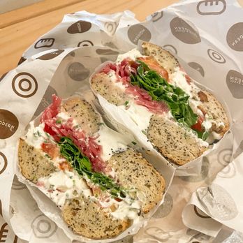 Modern Bread and Bagel - Superseed Bagel Sandwich with Chive Cream Cheese, Tomato, Arugula, and Pickled Onion - Breakfast & Brunch Near Me - Santa Monica, California Modern Bread and Bagel - Superseed Bagel Sandwich with Chive Cream Cheese, Tomato, Arugula, and Pickled Onion - Breakfast & Brunch Near Me - Santa Monica, California