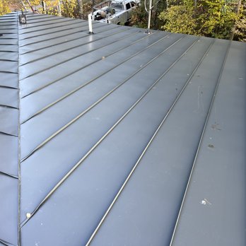 Fontaine Roofing & Siding - standing seam rolled hip - Roofing Near Me - Castleton, Vermont Fontaine Roofing & Siding - standing seam rolled hip - Roofing Near Me - Castleton, Vermont