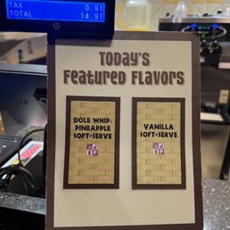 a sign for today's featured flavors