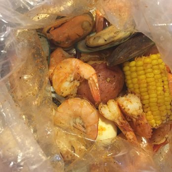 The Juicy Crab - Duluth - Steamed shrimp heads off, green muscles corn boiled eggs and potato in medium special juicy sauce - Seafood Near Me - Duluth, Georgia The Juicy Crab - Duluth - Steamed shrimp heads off, green muscles corn boiled eggs and potato in medium special juicy sauce - Seafood Near Me - Duluth, Georgia