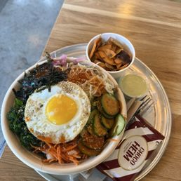 This is the K-Bibimbop comes with a fried sunny side egg on top so good. This is the K-Bibimbop comes with a fried sunny side egg on top so good.