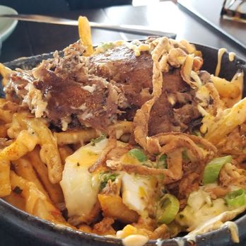 The Switchboard - The Best Kahlua Fries!! Crisp tender pork, drizzling fried egg, over crispy seasoned fries with some yummy sauce! - Hawaiian Near Me - Oceanside, California