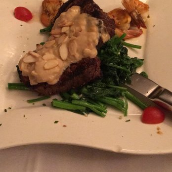Adega Grill - Filet mignon, shrimp and broccoli rabe topped with almond sauce - Portuguese Near Me - Newark, New Jersey Adega Grill - Filet mignon, shrimp and broccoli rabe topped with almond sauce - Portuguese Near Me - Newark, New Jersey