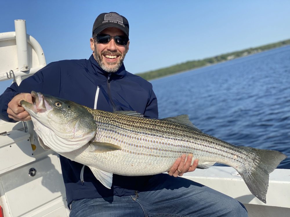 Tall Tailz Charters Logo