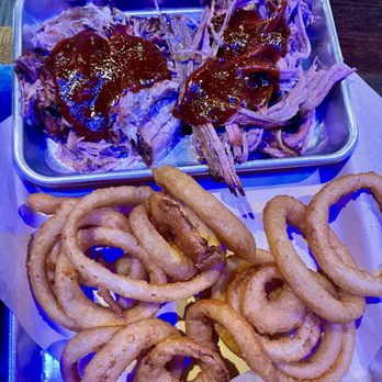 The Bone Yard Bar & Grill - Barbecue pulled pork and brisket with a side of onion rings - Barbeque Near Me - Big Bear Lake, California
