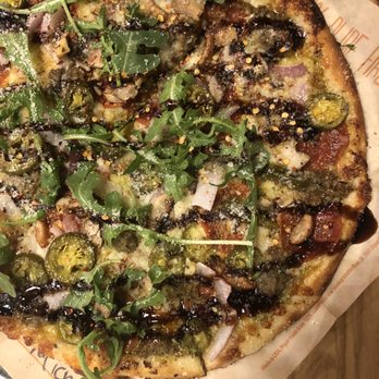 Blaze Pizza - Meat lovers with added jalapeños, red onions, arugula & roasted garlic - Pizza Near Me - Dewitt, New York Blaze Pizza - Meat lovers with added jalapeños, red onions, arugula & roasted garlic - Pizza Near Me - Dewitt, New York