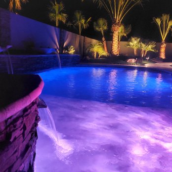 Alpha Pools and Landscape - a pool at night - Landscaping Near Me Alpha Pools and Landscape - a pool at night - Landscaping Near Me