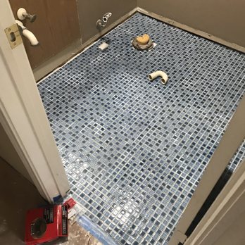 The Cabinet Shop - DURING: Old crappy floor gone, new floor installed. - Cabinetry Near Me