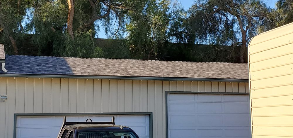 Slide of Three Clovers Roofing