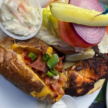 High Tide Restaurant - Blackened grouper sandwich with baked potato side - Seafood Near Me - Key Largo, Florida