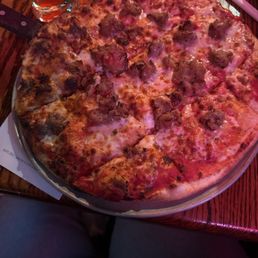 Thin crust sausage pizza