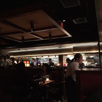 Houston's Restaurant - Interior (7) - Showing the professionalism of the staff, open kitchen, and great interior combined with dark restaurant. (3/3/2017) - American Near Me - Hackensack, New Jersey