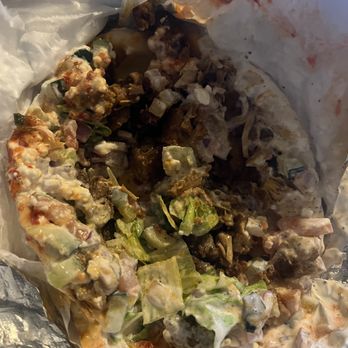 Austin’s Habibi  - Combo Wrap - gyro and chicken topped with lettuce, tomatoes, cucumber onion, feta cheese white sauce and spicy red sauce - Mediterranean Near Me - Austin, Texas