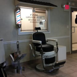 La Barberia - Classic chair in the waiting area.