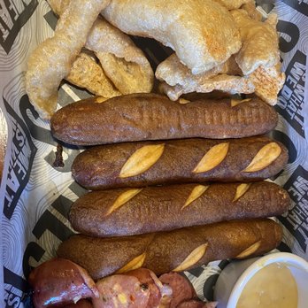 Smokey Bones - a variety of sausages and french fries - Barbeque Near Me - York, Pennsylvania Smokey Bones - a variety of sausages and french fries - Barbeque Near Me - York, Pennsylvania