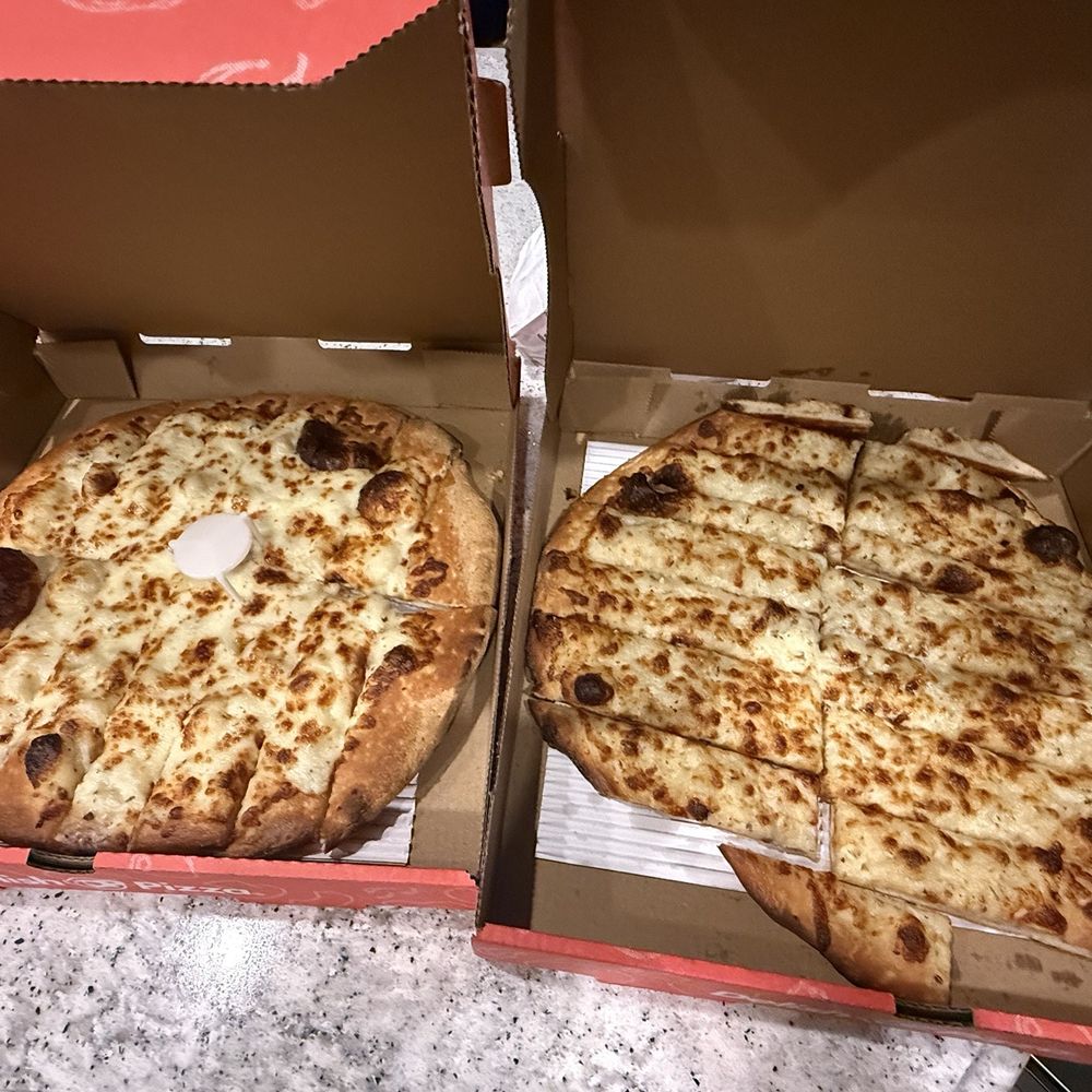 Delish Pizza - Cheese Breads--they made a mistake on one & rushed to correct it - Pizza Near Me - Roseville, California