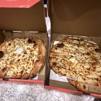 Delish Pizza - Cheese Breads--they made a mistake on one & rushed to correct it - Pizza Near Me - Roseville, California Delish Pizza - Cheese Breads--they made a mistake on one & rushed to correct it - Pizza Near Me - Roseville, California