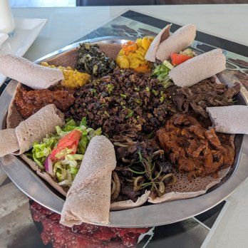 Addis Ethiopian - Veggie combo + meat combo + dulet. - Ethiopian Near Me - San Diego, California Addis Ethiopian - Veggie combo + meat combo + dulet. - Ethiopian Near Me - San Diego, California