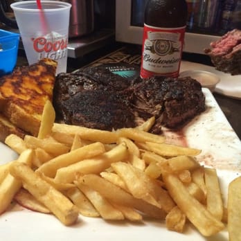 Murray's Saloon & Eatery - Rib Eye served medium rare.  AWESOME!!!!!  Standard sides are a shame, but life goes on... - Karaoke Near Me - Big Bear Lake, California