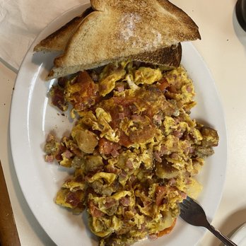 Nestico's Too - a plate of scrambled eggs and toast - Breakfast & Brunch Near Me - Syracuse, New York Nestico's Too - a plate of scrambled eggs and toast - Breakfast & Brunch Near Me - Syracuse, New York