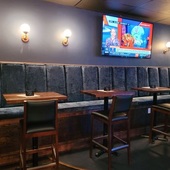 Whiskey Girl Tavern - bar seating with a flat screen tv - Sports Bars Near Me - Chicago, Illinois Whiskey Girl Tavern - bar seating with a flat screen tv - Sports Bars Near Me - Chicago, Illinois