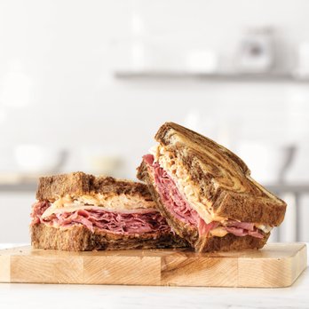 Arby's - a sandwich cut in half on a cutting board - Fast Food Near Me - Cortez, Colorado Arby's - a sandwich cut in half on a cutting board - Fast Food Near Me - Cortez, Colorado