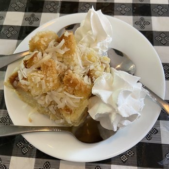 Olives Greek Taverna - Coconut bread pudding - Greek Near Me - Pittsford, New York Olives Greek Taverna - Coconut bread pudding - Greek Near Me - Pittsford, New York