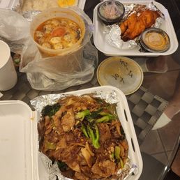 Tom Yum Chicken Soup, mango sticky rice, beef pad see ew, chicken satay