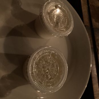 Vite Vinosteria - Pre-grated Parmesan in plastic condiment containers - Italian Near Me - Astoria, New York Vite Vinosteria - Pre-grated Parmesan in plastic condiment containers - Italian Near Me - Astoria, New York