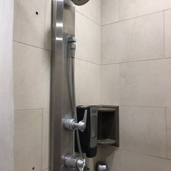 Flying J Travel Center - Hole in shower wall? Somebody's watching you? Could be? - Gas Stations Near Me - Gretna, Nebraska