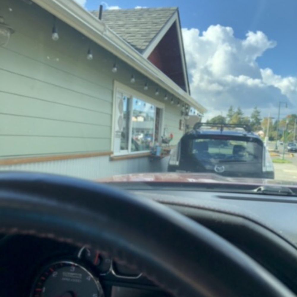 Hot Shots Espresso - a car driving down the street - Coffee & Tea Near Me - Montesano, Washington Hot Shots Espresso - a car driving down the street - Coffee & Tea Near Me - Montesano, Washington