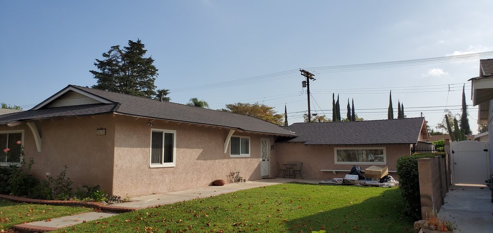 Slide of Three Clovers Roofing