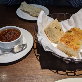 Panzano - Herb focaccia bread and olive tapenade. They need to bottle and sell that olive spread! - Italian Near Me - Denver, Colorado Panzano - Herb focaccia bread and olive tapenade. They need to bottle and sell that olive spread! - Italian Near Me - Denver, Colorado