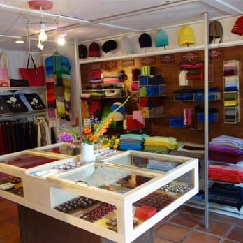 Chocolate + Cashmere - a woman in a clothing store - Desserts Near Me - Taos, New Mexico