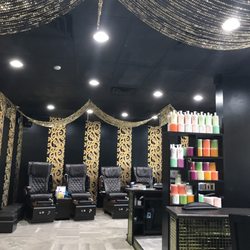 Nail Bar - All this and you can get a drink during your service. 12 pedicure chairs mean limited wait
