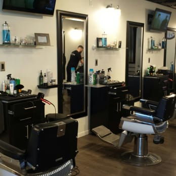 The Made Man Barber Shop - Cool decor. TV's too. - Barbers Near Me - Fords, New Jersey