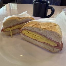 scrambled egg with ham on a roll