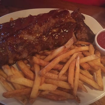 Outback Steakhouse - Baby back ribs very delicious - Steakhouses Near Me - Edgewater, New Jersey Outback Steakhouse - Baby back ribs very delicious - Steakhouses Near Me - Edgewater, New Jersey