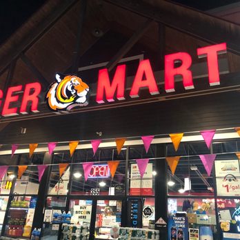 Dunkin' -  the front of a tiger mart store - Coffee & Tea Near Me - Little Falls, New Jersey