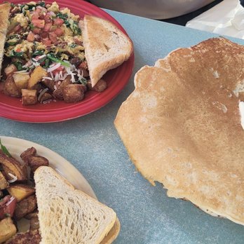 Loulou's Griddle In the Middle - Mediterranean scramble, squid and eggs and the giant pancake. All delicious! - Breakfast & Brunch Near Me - Monterey, California Loulou's Griddle In the Middle - Mediterranean scramble, squid and eggs and the giant pancake. All delicious! - Breakfast & Brunch Near Me - Monterey, California