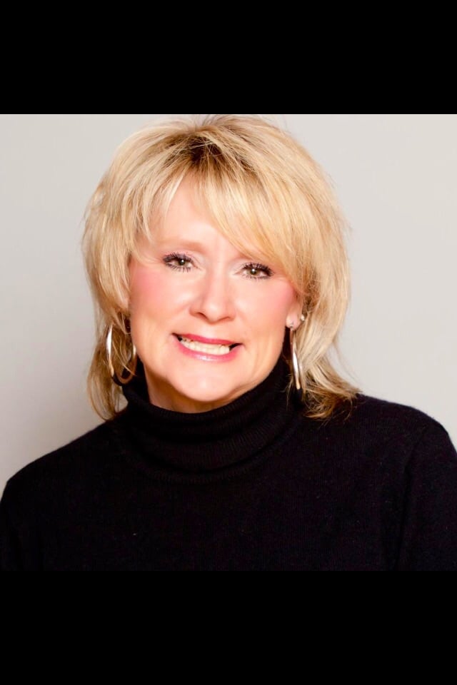 Donna Zuber at Shear Madness  Logo