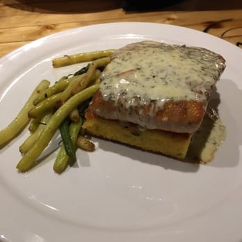 Fahrenheit 132 - Pan-Seared Atlantic Salmon with Lemon Dill Cream Sauce on a Polenta Cake - Steakhouses Near Me - Fredericksburg, Virginia Fahrenheit 132 - Pan-Seared Atlantic Salmon with Lemon Dill Cream Sauce on a Polenta Cake - Steakhouses Near Me - Fredericksburg, Virginia