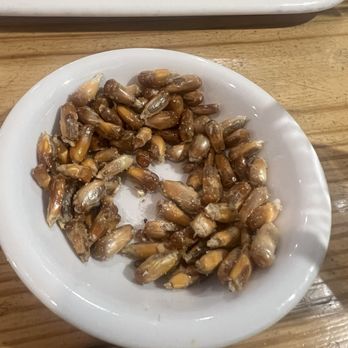 Pachamanka Authentic Peruvian Cuisine - Puffed corn.  Still have not decided if i like it after two bowls but its salty and you cant stop - Peruvian Near Me - Hollywood, Florida