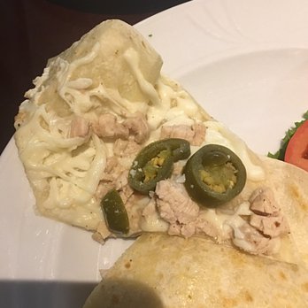 The Orchid Grill Restaurant - Bland Chicken and semi melted cheese in the Quesadilla. - American Near Me - Ontario, California