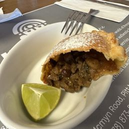Beef empanada we shared. Delicious! Beef empanada we shared. Delicious!