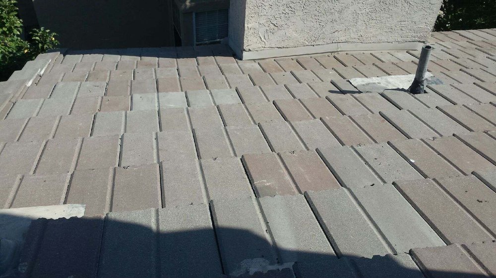 Slide of A E Roofing