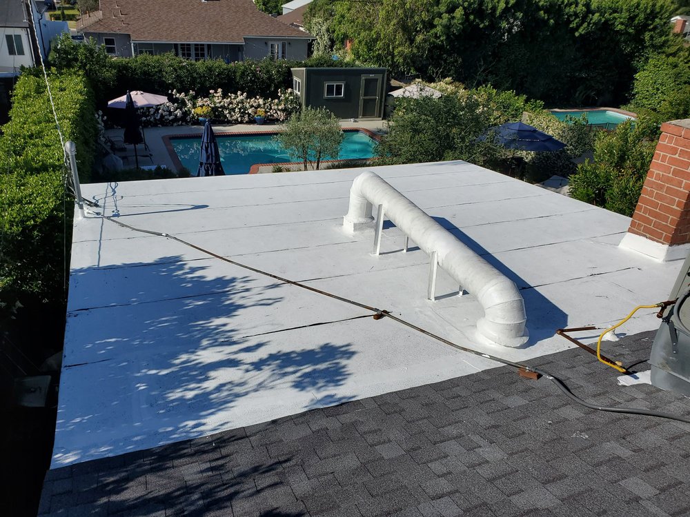 Slide of Trujano Roofing